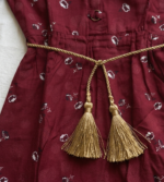 Printed cotton kurta featuring a round neckline, button placket, and a gathered waistline - Image 2