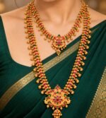 Traditional South Indian temple jewelry set with red and green stones - Image 2