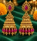 Ornate gold-plated temple jhumkas with ruby teardrop studs and pink beads. - Image 2